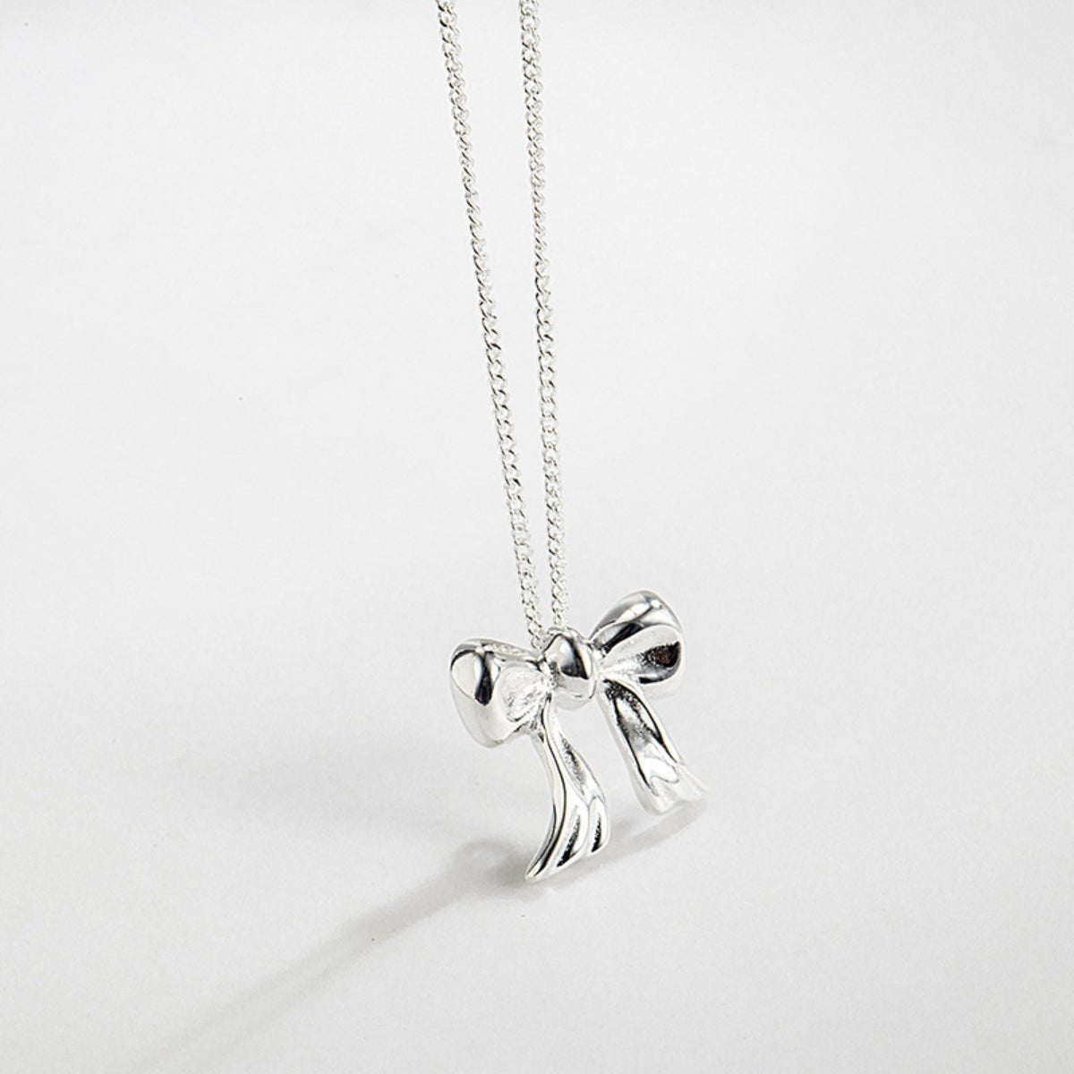 Copper Bow Shape Pendant Necklace - Loulou Boutique