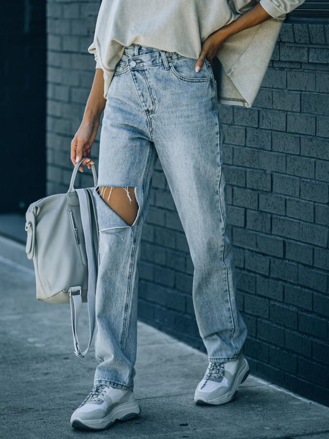 Distressed Asymmetric Waist Jeans - Loulou Boutique
