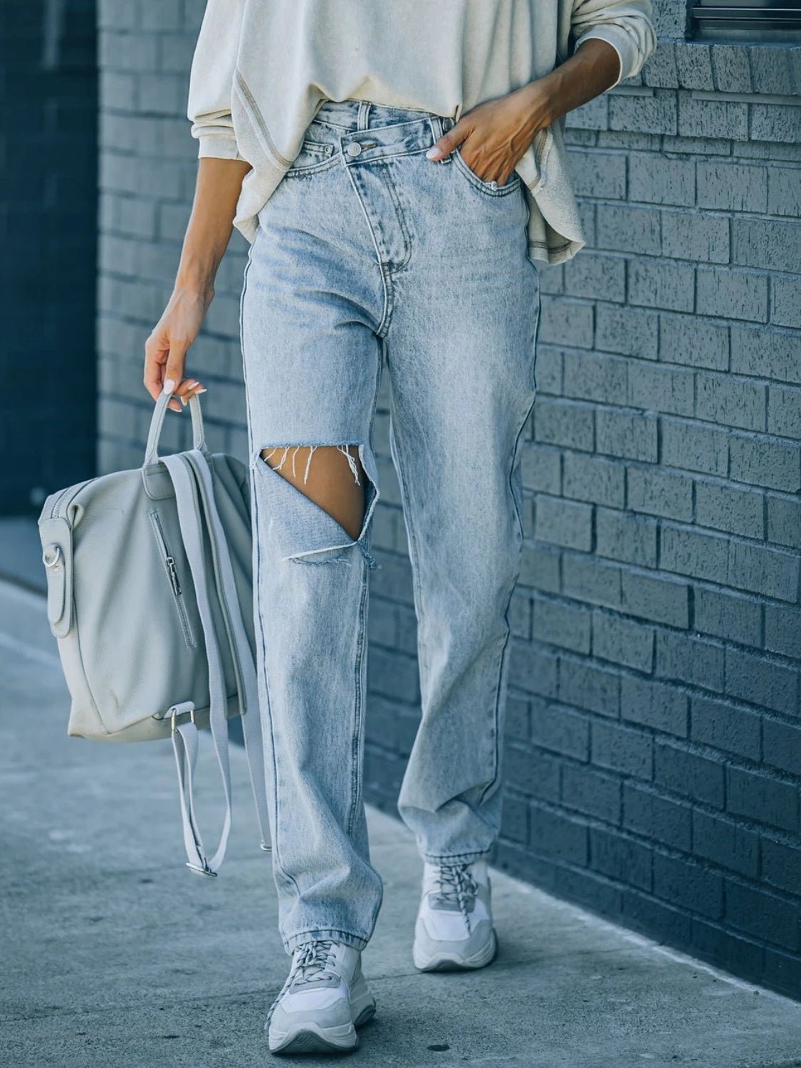 Distressed Asymmetric Waist Jeans - Loulou Boutique